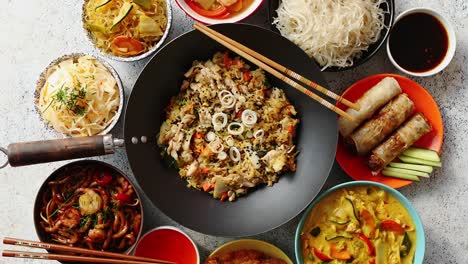 asian oriental food composition in colorful dishware