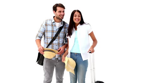 attractive young couple going on their holidays