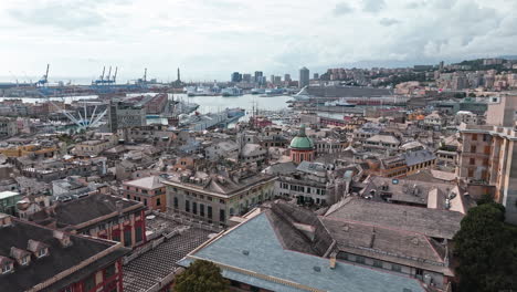 aerial over heart of genoa skyline with view of porto antico, liguria