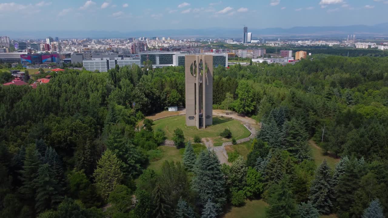 Aerial view of The Bells Monument in Sofia 'Kambanite', with Sofia Cityscape in the background, Bulgaria