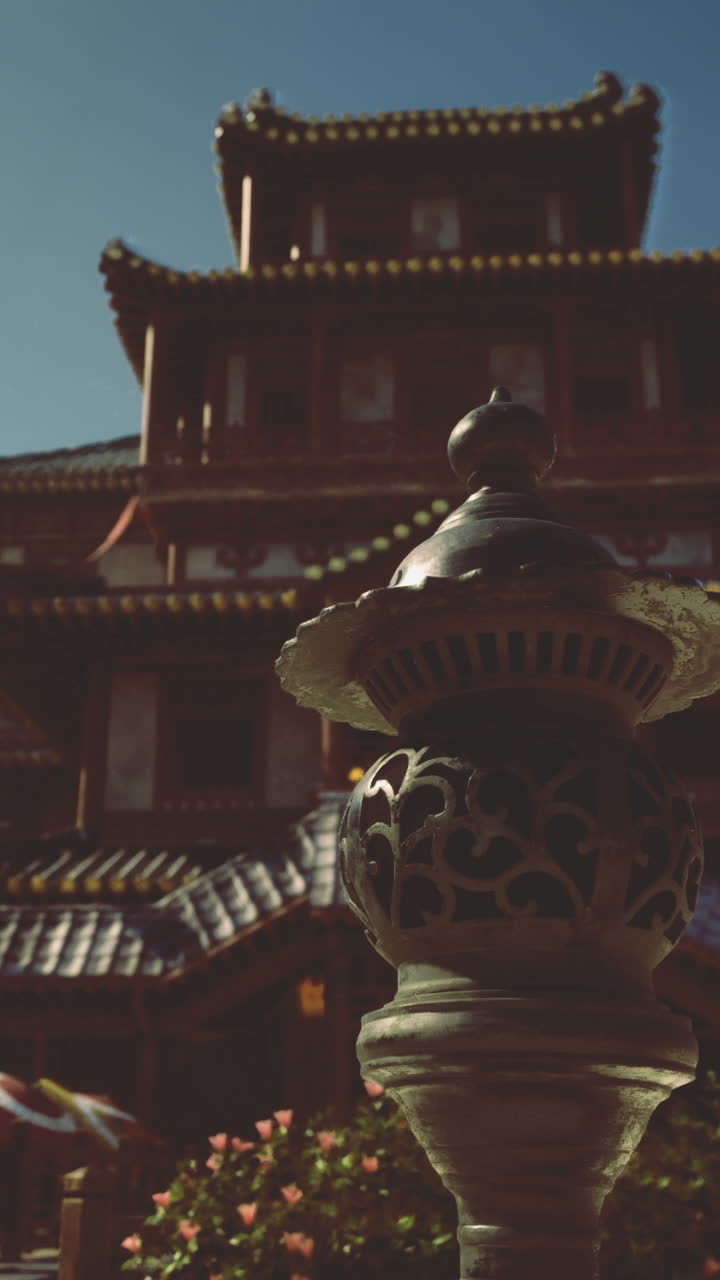 Beautiful traditional architecture at dusk with lanterns and garden features