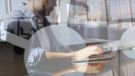 animation of shapes over caucasian businessman in office