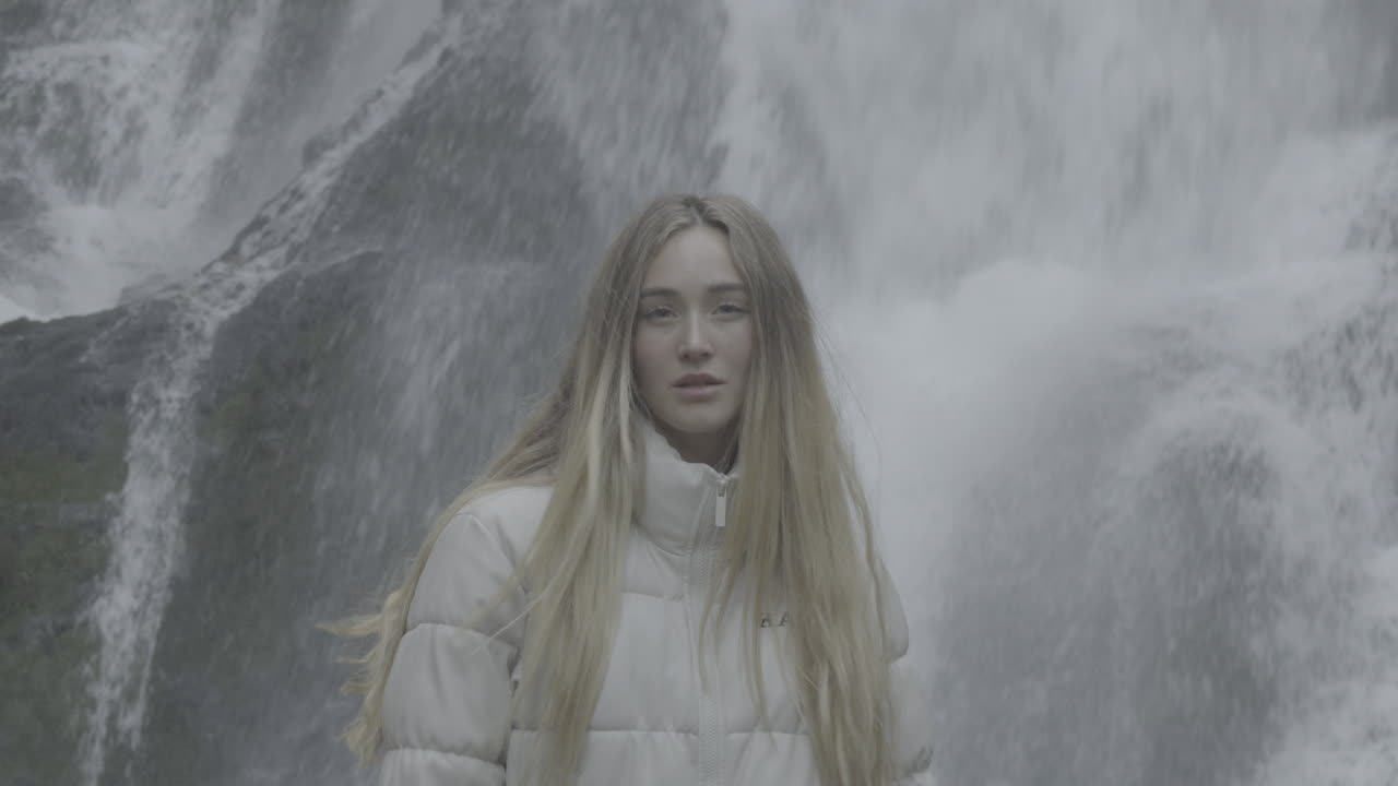 Woman by a Waterfall
