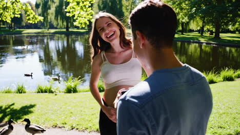 pregnant woman photographed in a park