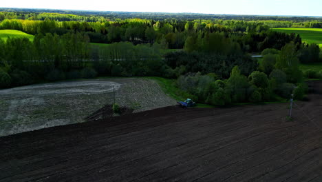 Rural-countryside-landscape-truck-works-in-agricultural-rural-fields-mixing-soil