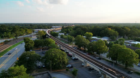 Aerial-view-of-subway-train-approaching-station