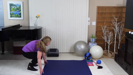 sandra gets equipment ready to start stair stepping