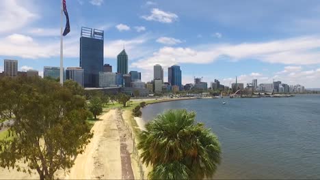 beautiful drone shot flying towards perth cbd in western australia on a gorgeous summers day, blue skies with few clouds