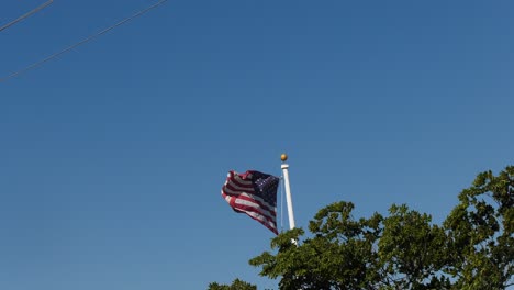 american flag blowing in the breeze