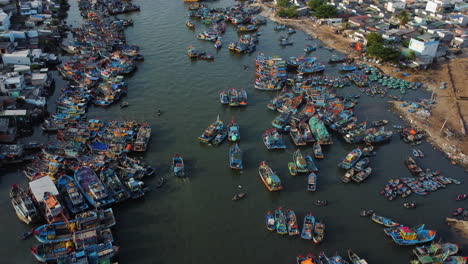 overpopulated harbor with fishing boats in vietnam, aerial view la gi, binh thuan, south vietnam