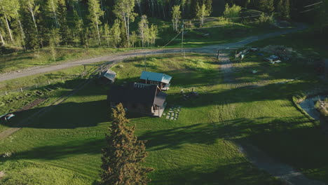 aerial orbit over ranchland cabin
