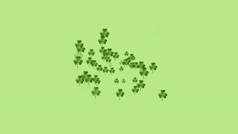 digital animation of multiple clover leaves forming against green background