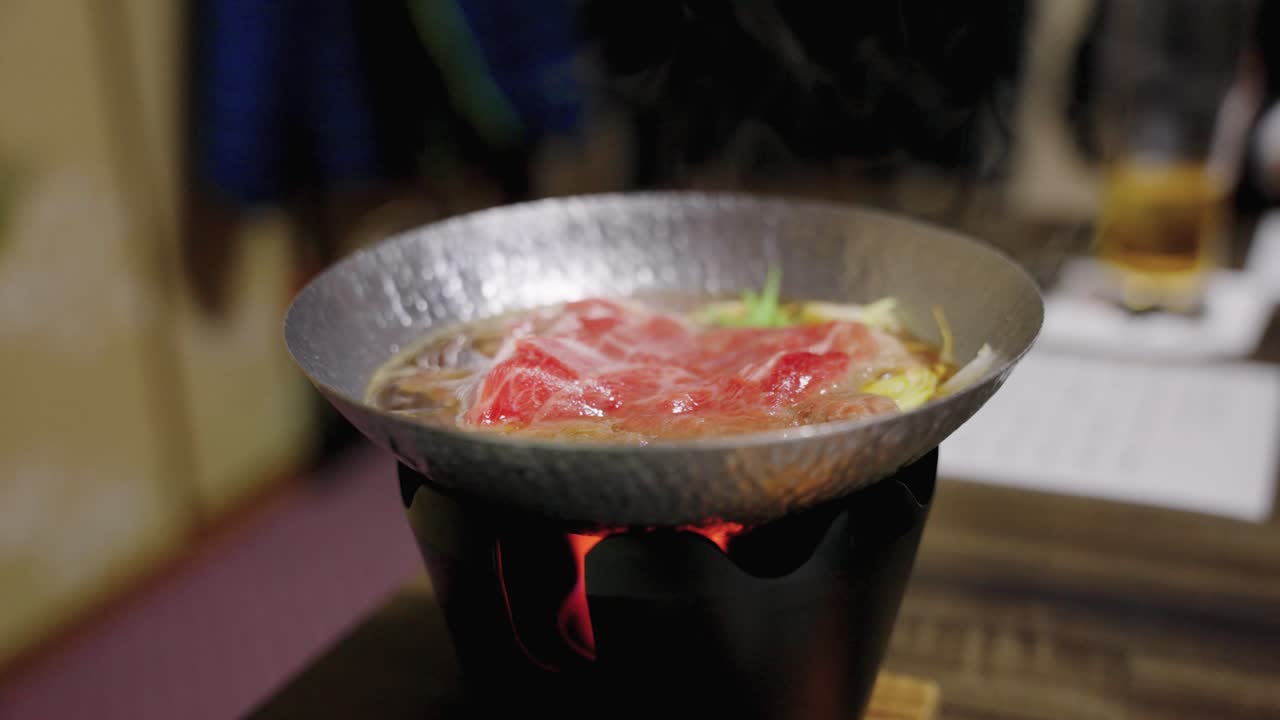 Japanese Wagyu Being Cooked Sukiyaki, Hot Pot Style in Banquet