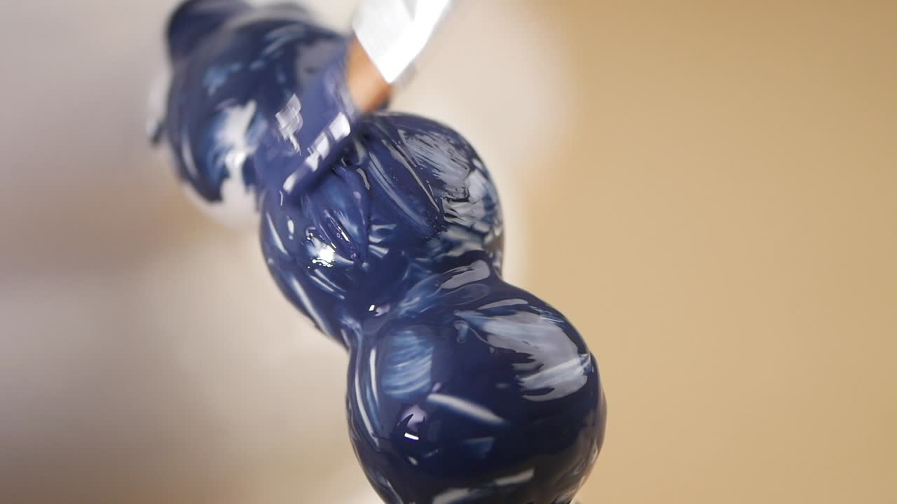Blue Paint on Sculpture