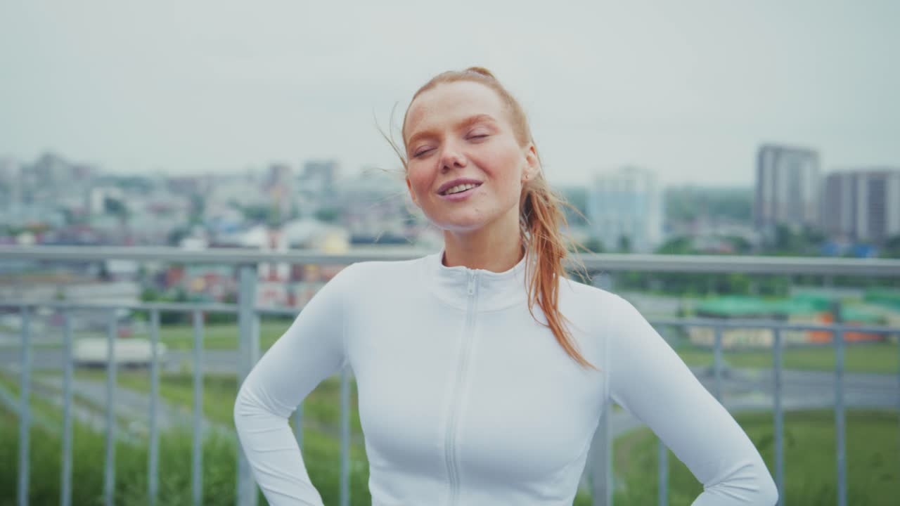 Woman in athletic wear in a city setting