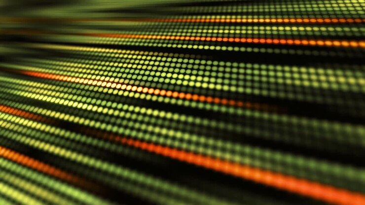 Futuristic Grid of Moving Green and Orange Dots
