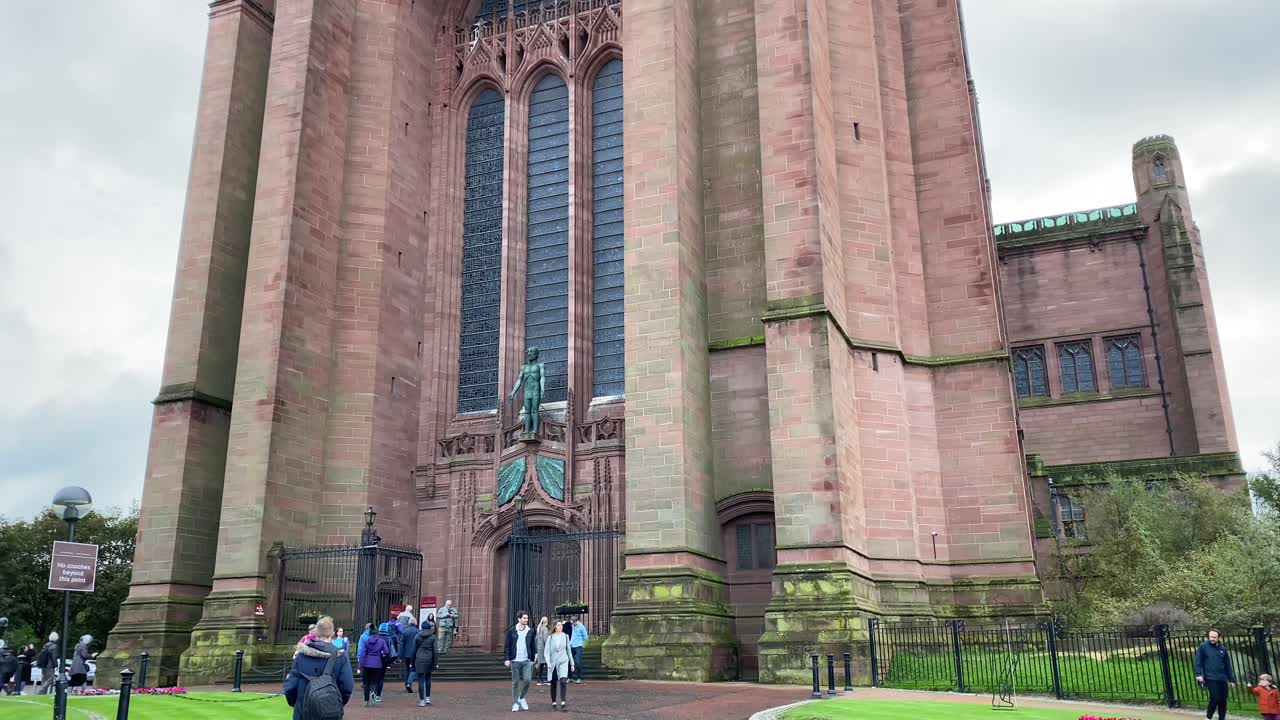 Tilt up shot of the Liverpool cathedral on a cloudy day.