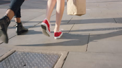 girl friends walking shopping in the city