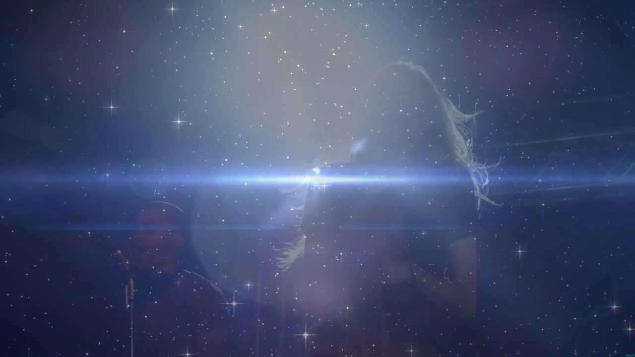 Spotlight sparking lens flare and stars layering over stage, lead singer turning to mic for music