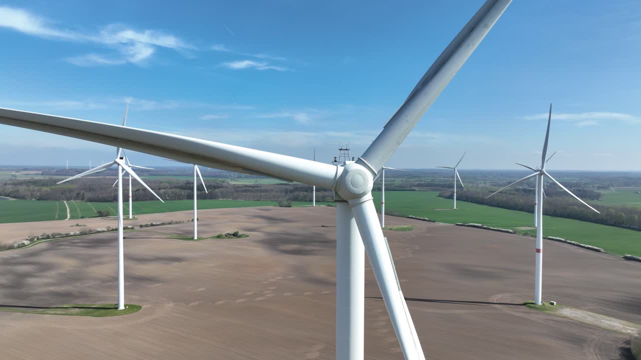 wind turbines in open field, renewabale energy, clean, climate change solution, energy transistion. Aerial view.