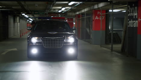 policemen riding patrol car. police officers chasing criminal on patrol vehicle