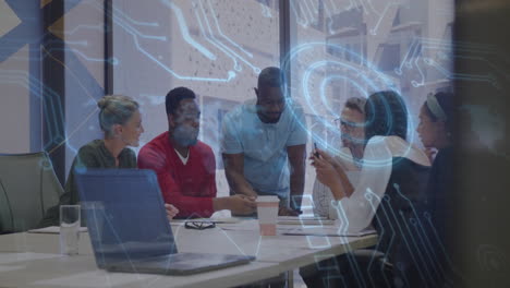diverse team collaborating at office with digital network overlay animation
