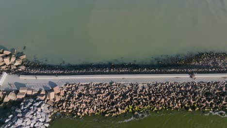 Aerial-view-The-northern-breakwater-is-made-of-stone-and-adapted-for-safe-walking-by-people