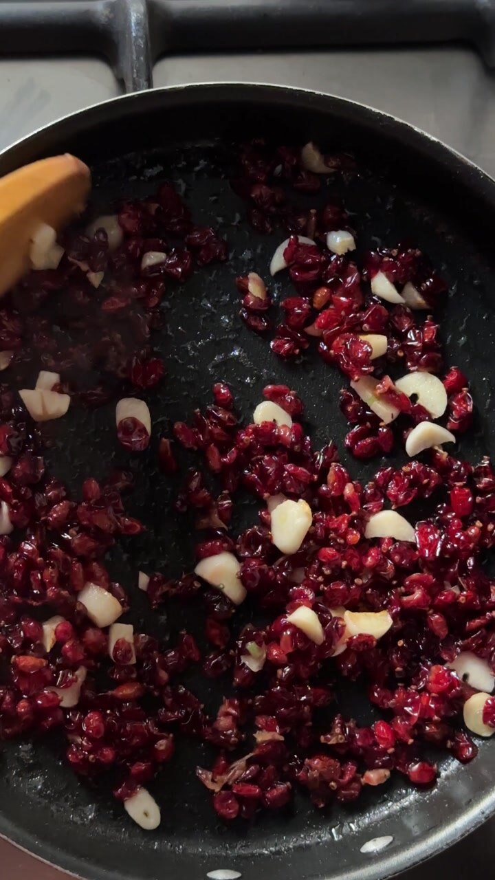 cooking in frying pan roast barberries toast garlic cook omelet using butter sheep ghee fry egg in Persian breakfast style of food cuisine delicious cooking recipe gourmet traditional Iran kitchen