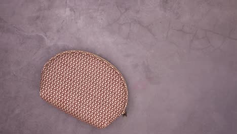 various make up products come from make up kit on dark theme. stop motion