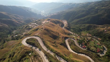 winding car road in the mountain hills of junquito, venezuela, offering scenic views