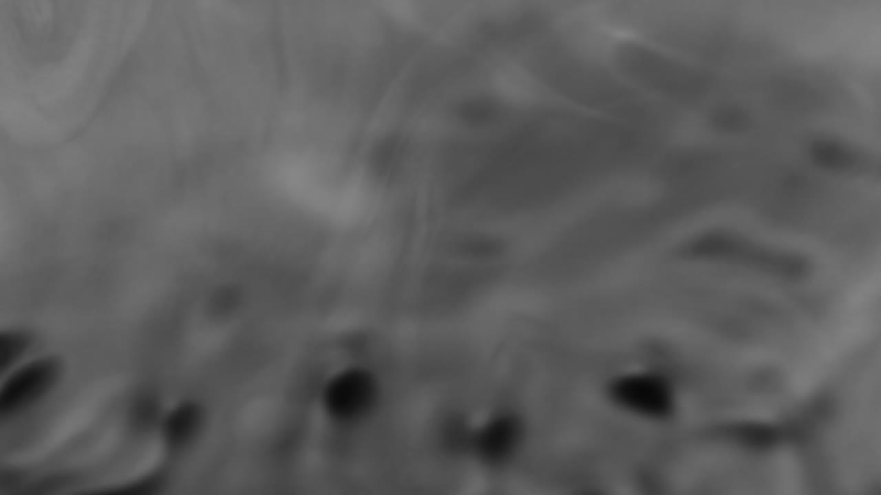 Splashes and drops on the surface of the liquid. Abstract Black Background Water vibration. 4K slow motion 100 fps, ProRes 422, 10 bit