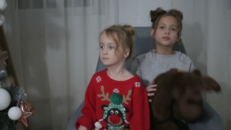 adorable little children rejoice in the holy christmas merry christmas and happy holidays merry christmas and happy holidays adorable little children make cards gifts and decorations for the holiday cute kids are engaged in creativity sisters with new year gifts