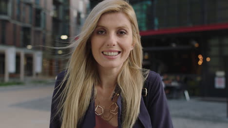 portrait of young beautiful blonde woman smiling happy enjoying urban lifestyle