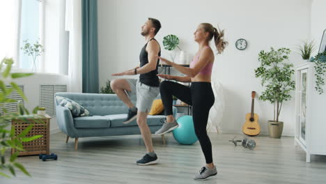 couple exercising at home