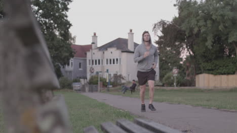 Young-Athletic-Man-Goes-for-Run-In-The-Park---Ungraded