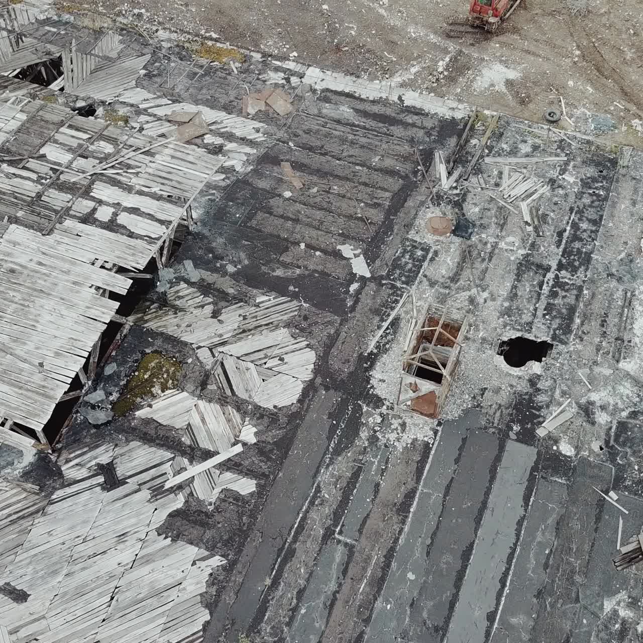 Flight over the destroyed factory. Old industrial building for demolition. Aerial view