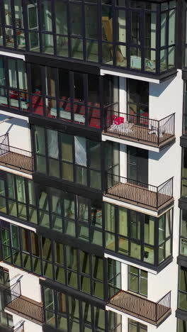 modern buildings aerial view. urban cityscapes architecture exterior construction. vertical video