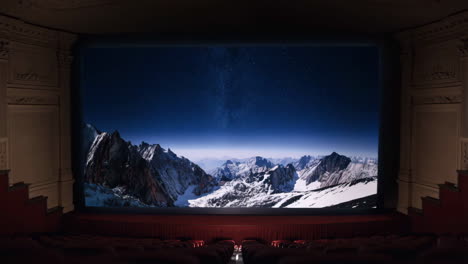 movie screen displaying a starry mountain landscape