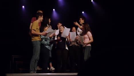 Teenagers-rehearsing-in-a-theatre