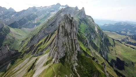 drone footage of the steep ridge in schäfler, alpstein, in the apenzell canton in switzerland