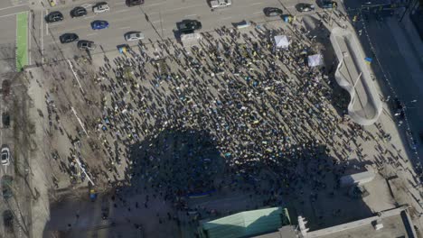 crowd of people at the vancouver art gallery plaza during pro-ukrainian rally in british columbia, canada