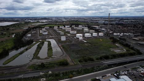 Aerial-Oil-Petroleum-refinery-and-white-storage-tanks-Altona,-Melbourne