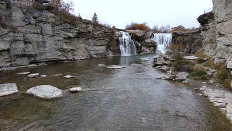 Slow-motion-aerial-shot-approaching-Waterfalls-in-southern-Alberta,-Canada