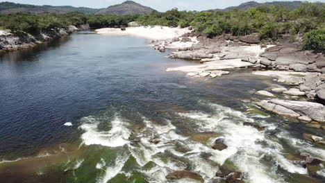 beautiful aerial view over exotic tropical river and mountain in south america