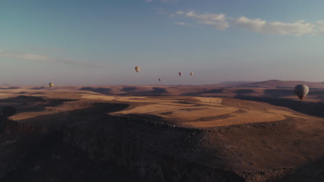 hot air balloons over cappadocian landscapes