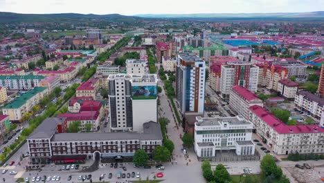 grozny, the chechen republic of ichkeria, caucasus, russia - 6 september 2019: day of civil concord and unity celebration in capital near the heart of chechnya. people on square near islamic mosque