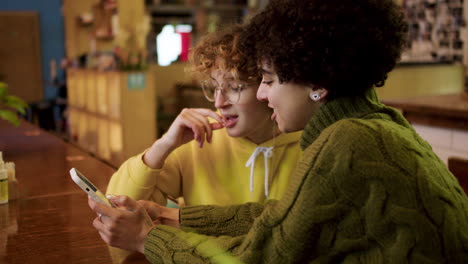 lesbian couple in a bar