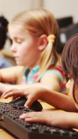 pupils in computer class at school