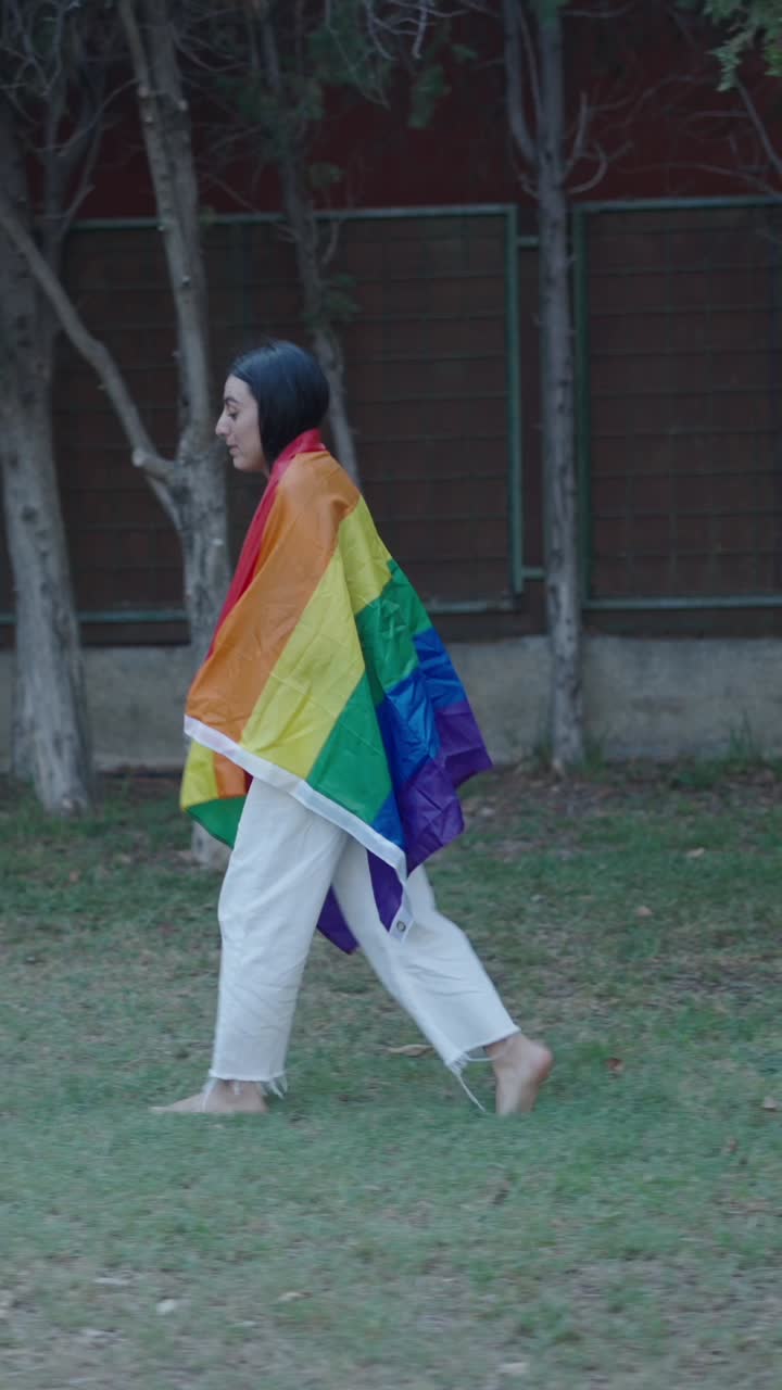 Person with LGBTQ Rainbow Flag