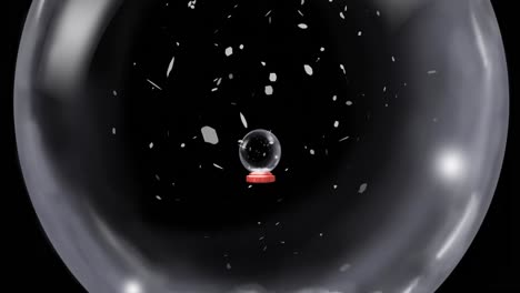 Animation-Einer-Weihnachtlichen-Schneekugel-Mit-Schnee,-Der-Auf-Schwarzem-Hintergrund-Fällt